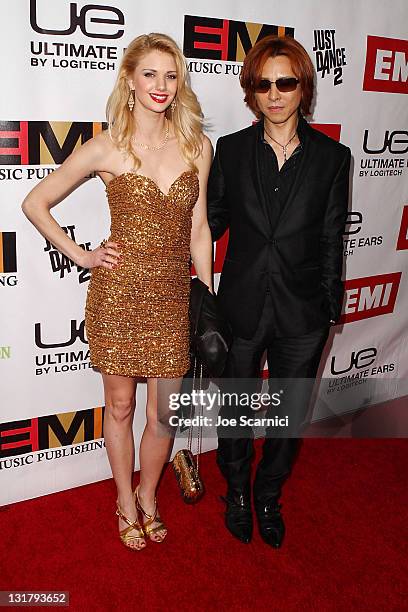 Katie Fitzgerald and Yoshiki arrive at Ultimate Ears By Logitech Presents The EMI Grammys After Party at Milk Studios on February 13, 2011 in...