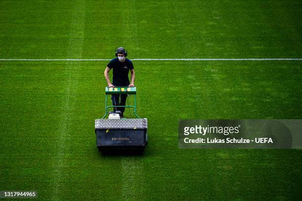 General view inside the stadium with green keepers at work ahead of the UEFA Women's Champions League Final match between Chelsea FC and Barcelona at...