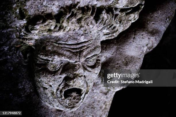 monster and grotesque sculpture in the forest - grotesque stock pictures, royalty-free photos & images