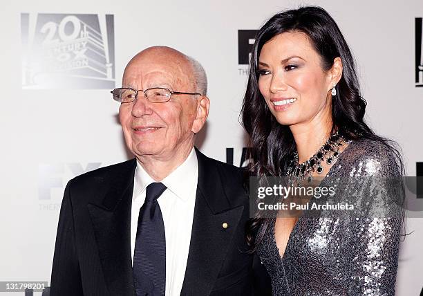 Rupert Murdoch and wife producer Wendi Murdoch arrive at the FOX 2011 Golden Globes after party at 9900 Wilshire Blvd on January 16, 2011 in Beverly...