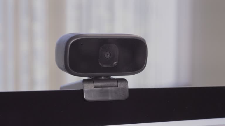 https://media.gettyimages.com/id/1317983015/video/close-up-of-webcam-attached-to-home-office-computer-monitor.jpg?b=1&s=640x640&k=20&c=uvpxx66umi4JDIWmDGLcFAGU4CjAQpwY-k-oTNMt1jk=