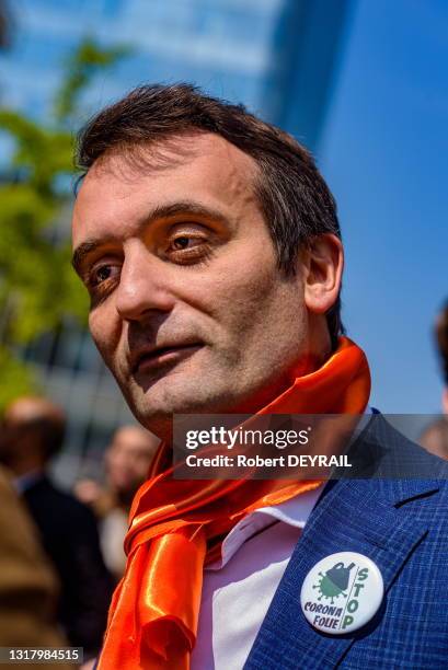 Portrait de Florian Philippot président du parti "Les Patriotes" portant un badge "STOP CORONAFOLIE" lors du rassemblement "anti-confinement" contre...