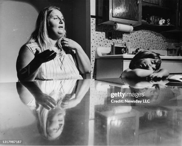 Carmen Wojtowicz and Dawn Marie, wife and daughter of bank robber John Wojtowicz at her home in Brooklyn on August 23, 1972. John Wojtowicz's life...