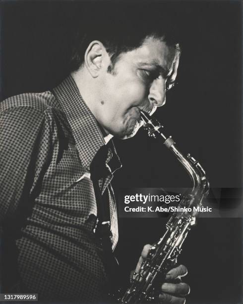 Art Pepper plays the alto sax in checked shirts, Tokyo, Japan, 1978.