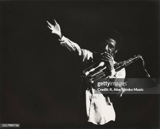 Sonny Rollins announces with his right hand up, Shiba Postal Savings Hall, Tokyo, Japan, 3rd February 1979.