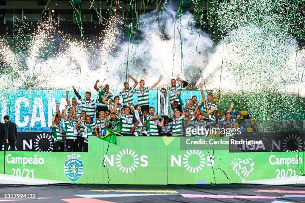 Sporting CP players celebrate with the trophy wining the game and become Champions at the of the match of the Liga NOS match between Sporting CP and...