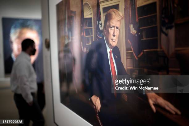 Patrons view a portrait of former U.S. President Donald Trump in the America’s Presidents exhibition at the National Portrait Gallery as the...