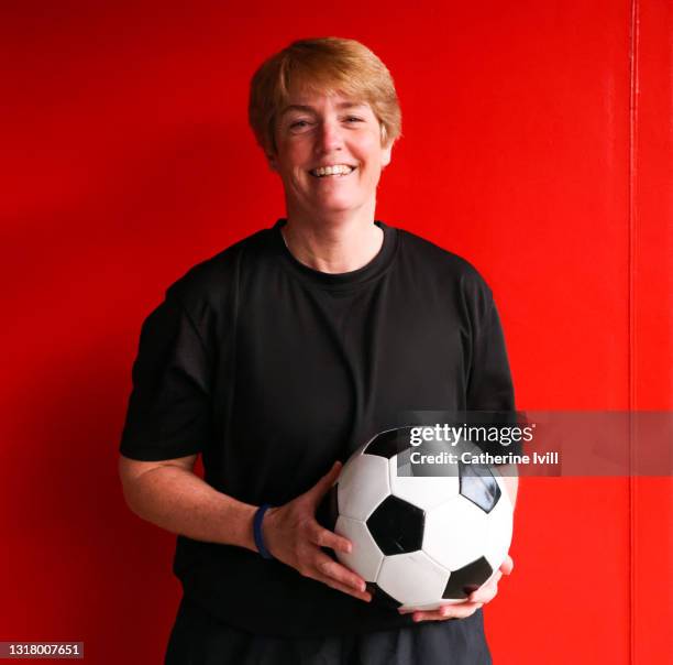 portrait of confident female soccer player - menopossibilities stock pictures, royalty-free photos & images