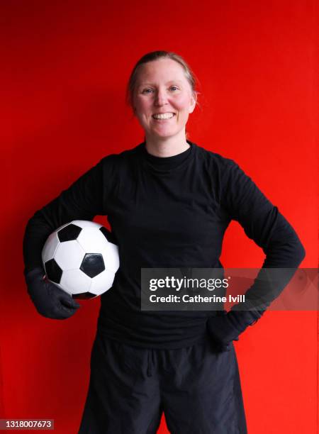 portrait of confident female soccer player - menopossibilities stock pictures, royalty-free photos & images