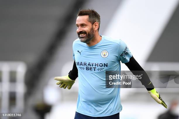 Scott Carson of Manchester City warms up prior to the Premier League match between Newcastle United and Manchester City at St. James Park on May 14,...
