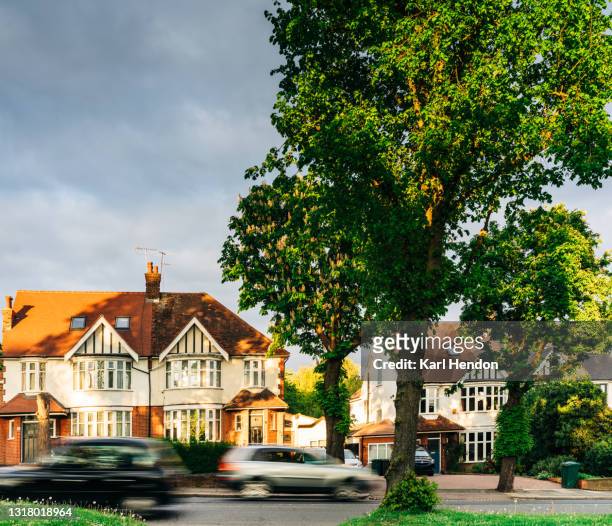 a sunset view of a suburban street in london - stock photo - uk town stock pictures, royalty-free photos & images
