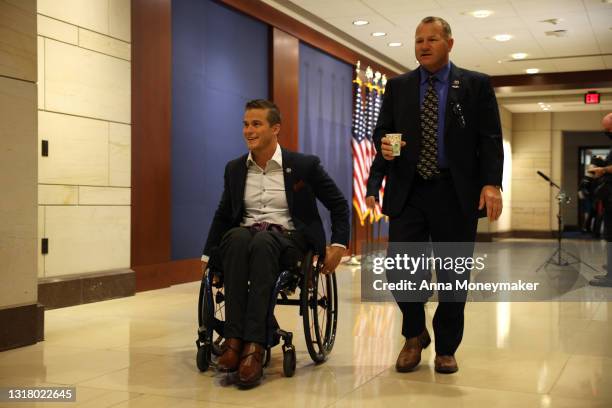 Rep. Madison Cawthorn and Rep. Troy Nehls arrive to a caucus meeting to pick a replacement for Rep. Liz Cheney as Chair of the House Republican...