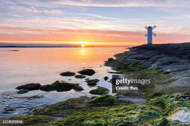 stawa młyny (german: mühlenbake) in the shape of a windmill (świnoujście/ poland) - poland sea stock pictures, royalty-free photos & images