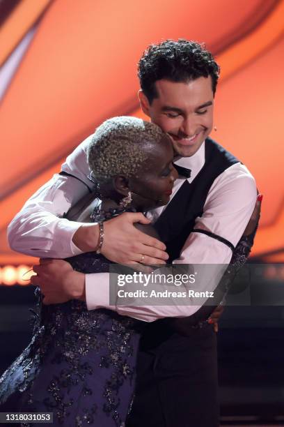 Auma Obama and Andrzej Cibis react after being voted out of the show during the 10th show of the 14th season of the television competition "Let's...