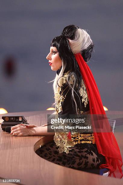 Lady Gaga attends the 'Le Grand Journal' tv show at Martinez Beach Pier on May 11, 2011 in Cannes, France.