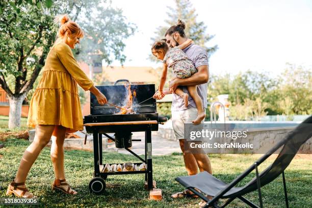 let's make it delicious - backyard fire stock pictures, royalty-free photos & images