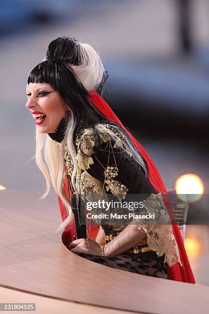 Lady Gaga attends the 'Le Grand Journal' tv show at Martinez Beach Pier on May 11, 2011 in Cannes, France.