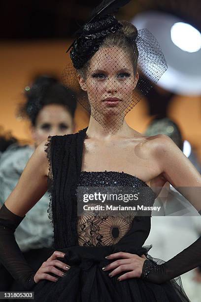 Model showcases designs by Matthew Eager on the catwalk during the finale at the Myer Autumn/Winter Season Launch 2011 Show at The Royal Exhibition...