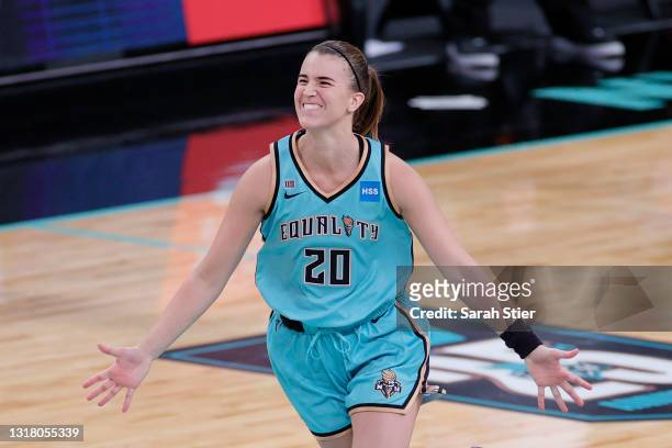 Sabrina Ionescu of the New York Liberty reacts after making a three-point basket in the final seconds of the second half against the Indiana Fever at...
