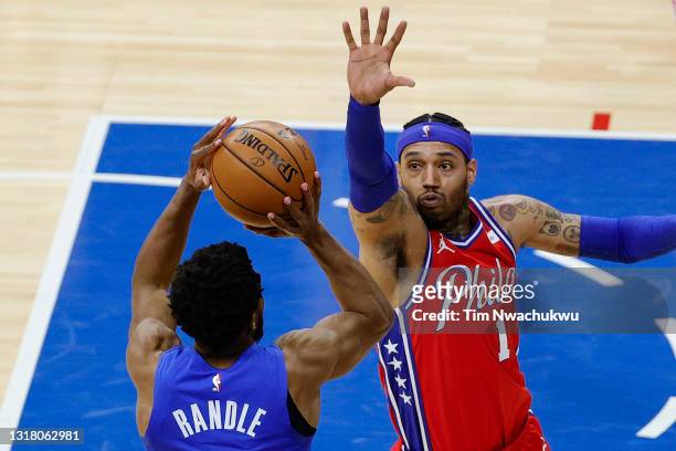 Mike Scott of the Philadelphia 76ers guards Chasson Randle of the Orlando Magic during the third quarter at Wells Fargo Center on May 14, 2021 in...
