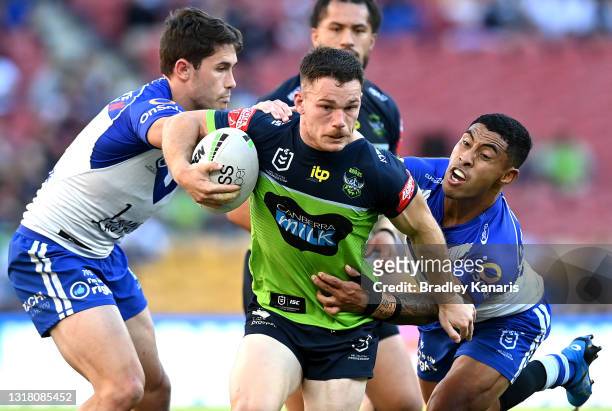 Tom Starling of the Raiders attempts to break through the defence during the round 10 NRL match between the Canterbury Bulldogs and the Canberra...