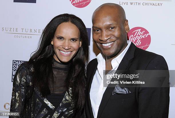 Amanda Lutrell-Garrigus and Marcellus Reynolds attend The Supper Club Star-Studded Oscar Soiree & Special Preview Of 2011 Suzie Turner Red Carpet...