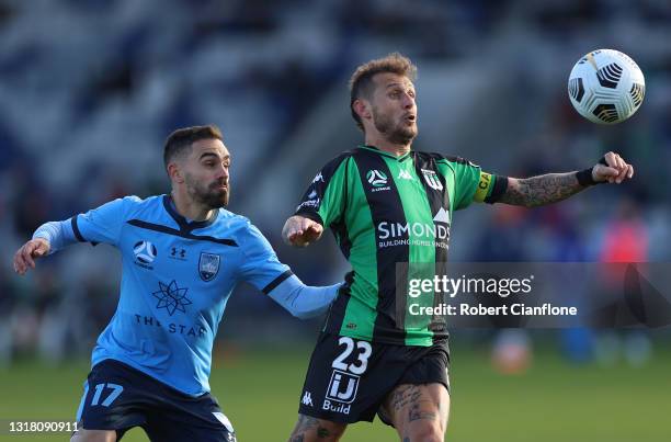 Alessandro Diamanti of Western United is pressured by Anthony Caceres of Sydney FC during the A-League match between Western United and Sydney FC at...
