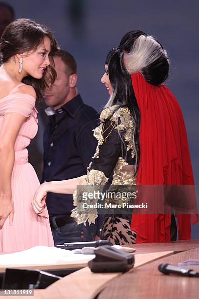 Charlotte Le Bon and Lady Gaga attend the 'Le Grand Journal' tv show at Martinez Beach Pier on May 11, 2011 in Cannes, France.