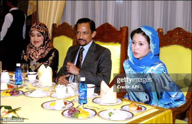 The Sultan of Brunei Hassanal Bolkiah with his wifes Anak Saleha and Azrinaz Mazhar Hakim .