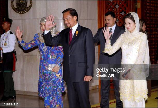 The Sultan of Brunei Hassanal Bolkiah with his wifes Anak Saleha and Azrinaz Mazhar Hakim .