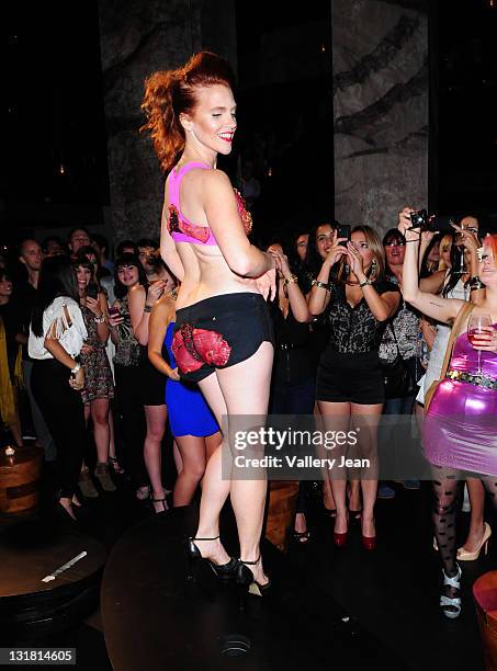 Model walks the runway during the Haute CUTure Fashion Show and Red Carpet Event showcase host by World renowed designer of Lady Gaga's Meat Dress...