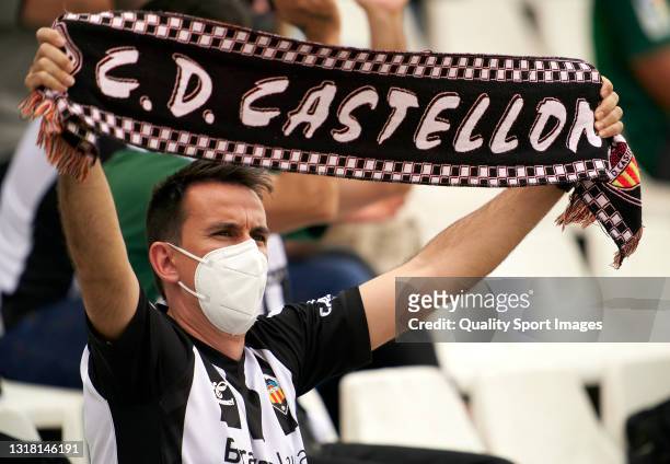 Castellon fan holds up a scarf during the Liga Smartbank match between CD Castellon and SD Ponferradina at Nou Castalia on May 15, 2021 in Castellon...