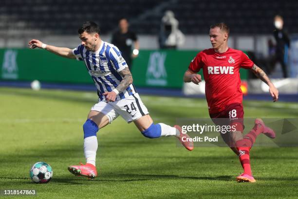 Nemanja Radonjic of Hertha BSC is challenged by Ondrej Duda of 1. FC Koeln during the Bundesliga match between Hertha BSC and 1. FC Koeln at...