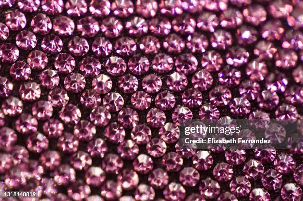 full frame view of tiny pink rhinestones - rhinestone fotografías e imágenes de stock