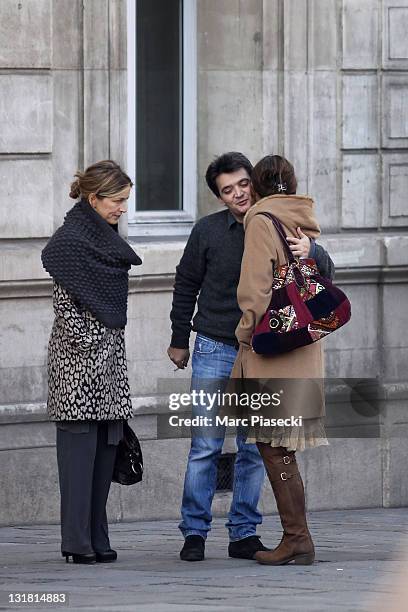 Ingrid Betancourt and movie producer Thomas Langmann leave the 'La Societe' restaurant on March 5, 2011 in Paris, France.