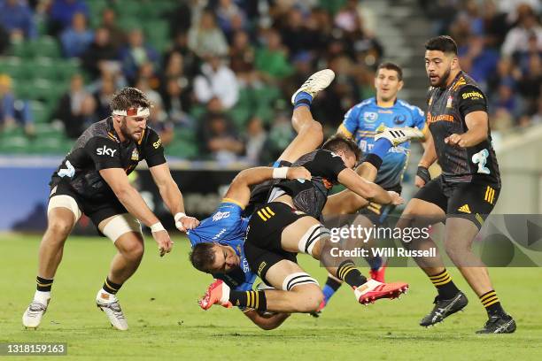 Richard Kahui of the Force is tackled during the round one Super Rugby Trans-Tasman match between the Western Force and the Chiefs at HBF Park on May...