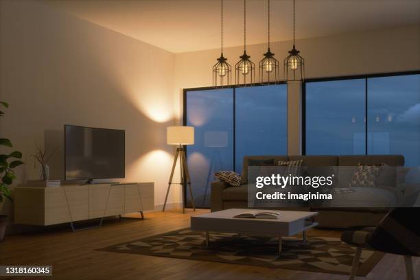 skandinavischer stil wohnzimmer interieur bei nacht - modern minimal living room stock-fotos und bilder