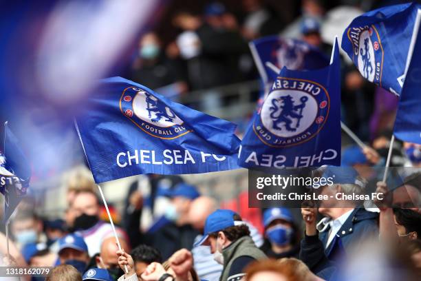 Chelsea fans wave flags prior to The Emirates FA Cup Final match between Chelsea and Leicester City at Wembley Stadium on May 15, 2021 in London,...