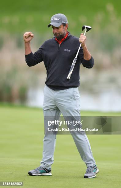 Richard Bland of England celebrates beating Guido Migliozzi of Italy after a one hole play off to win The Betfred British Masters hosted by Danny...