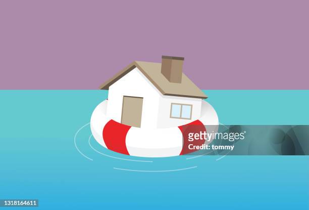 ein hausschwimmen mit einer rettungsringe im meer - buoy stock-grafiken, -clipart, -cartoons und -symbole