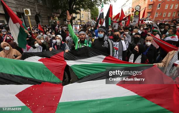 Protesters march on Al Nakba Day to demonstrate for the rights of Palestinians on May 15, 2021 in Berlin, Germany. This year's protests are taking...