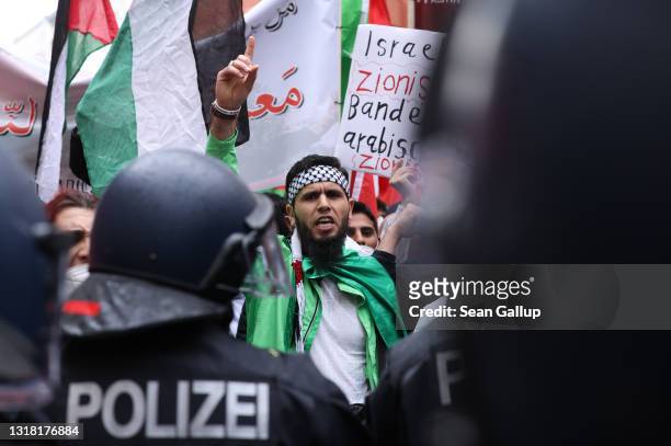 Protesters march on Al Nakba Day in Neukoelln district to demonstrate for the rights of Palestinians on May 15, 2021 in Berlin, Germany. This year's...
