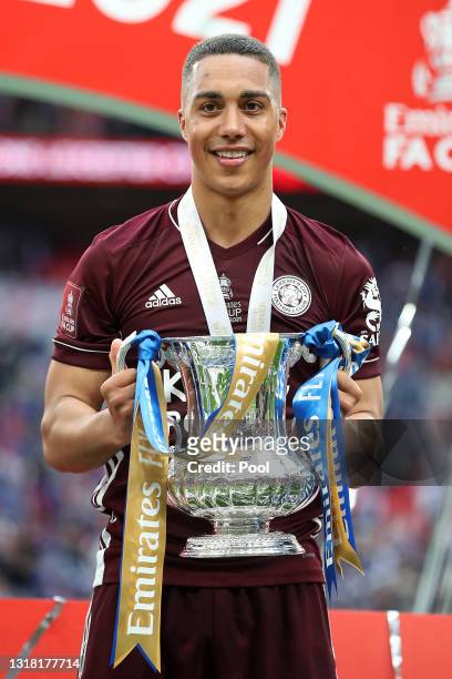 Youri Tielemans of Leicester City celebrates with the Emirates FA Cup trophy following The Emirates FA Cup Final match between Chelsea and Leicester...