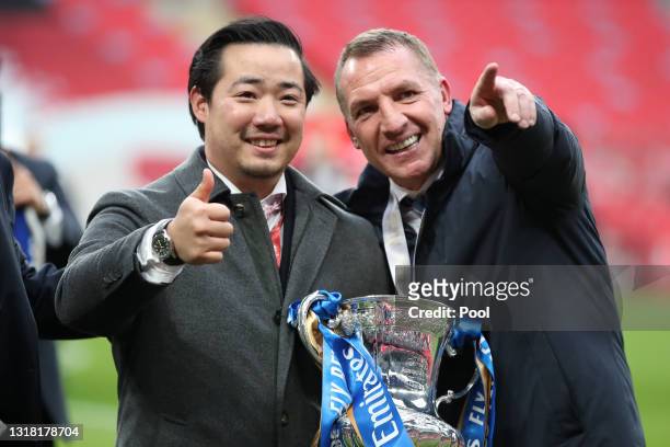 Khun Top, Chairman of Leicester City celebrates with Brendan Rodgers , Manager of Leicester City following The Emirates FA Cup Final match between...