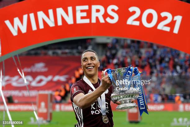 Youri Tielemans of Leicester City celebrates with the Emirates FA Cup trophy following The Emirates FA Cup Final match between Chelsea and Leicester...