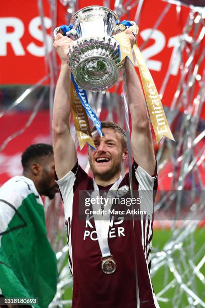 Jamie Vardy of Leicester City lifts the Emirates FA Cup Trophy, following his team's victory in The Emirates FA Cup Final match between Chelsea and...