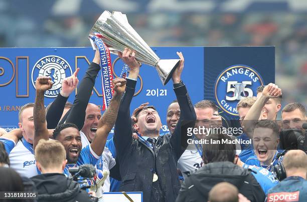 Rangers Manager Steven Gerrard lifts the trophy during the Scottish Premiership match between Rangers and Aberdeen on May 15, 2021 in Glasgow,...