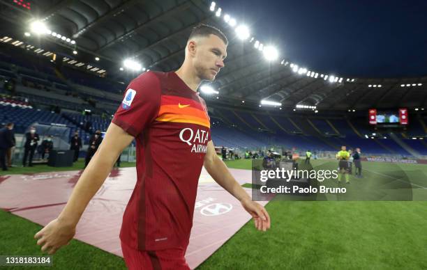 Edin Dzeko of A.S Roma walks out onto the pitch during the Serie A match between AS Roma and SS Lazio at Stadio Olimpico on May 15, 2021 in Rome,...