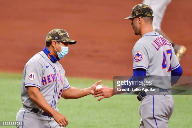 Manager Luis Rojas of the New York Mets relieves Joey Lucchesi in the fourth inning at Tropicana Field on May 15, 2021 in St Petersburg, Florida.