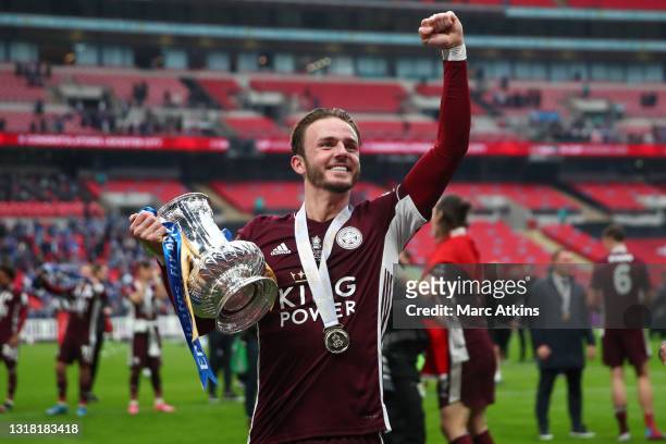 James Maddison of Leicester City celebrates with the Emirates FA Cup trophy following his team's victory in The Emirates FA Cup Final match between...